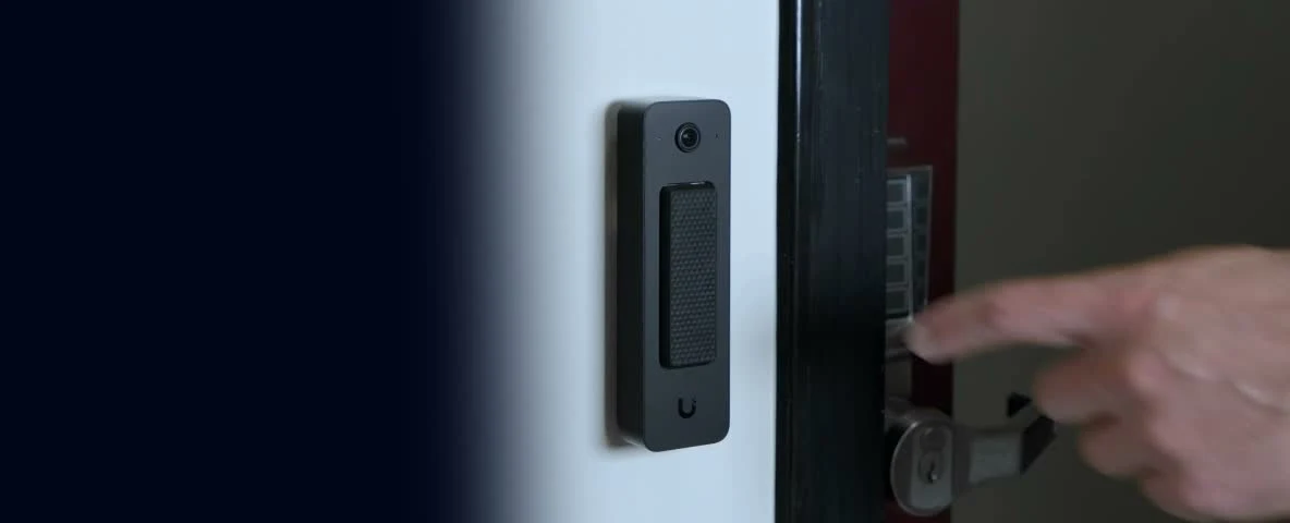 A managed entry reader installed at a door