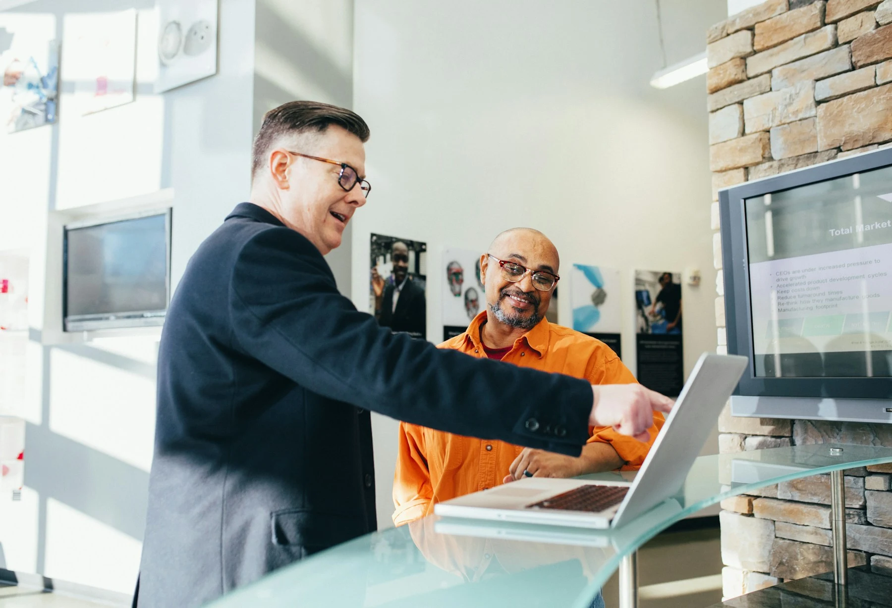 A conversation about work at a laptop